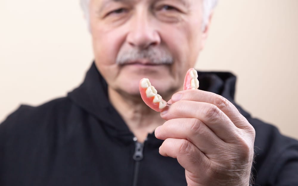 implant supported dentures clinton